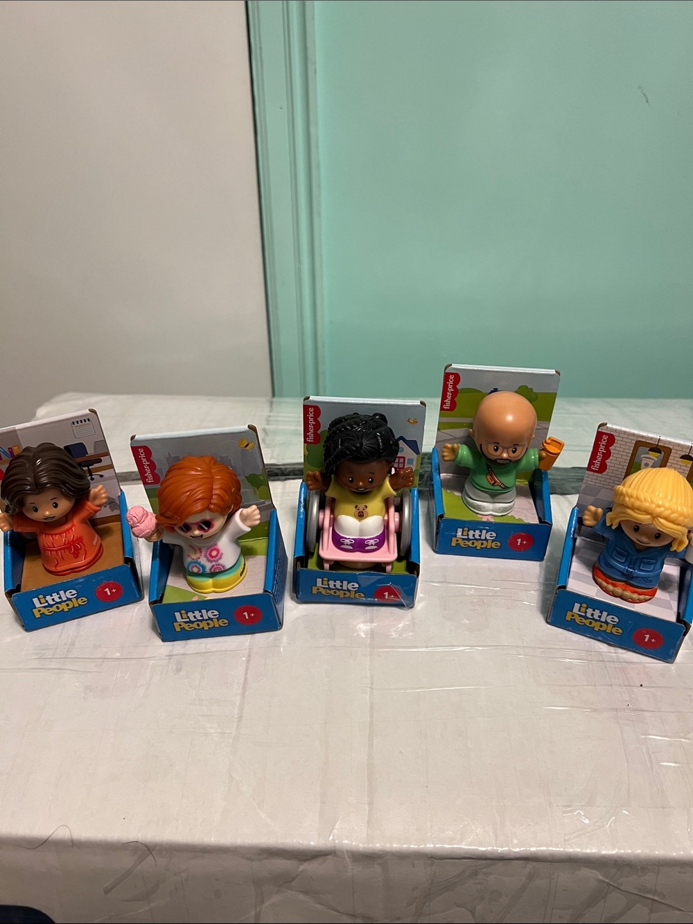 Fisher-Price Little People Assortment — Blue, Orange, Blonde & Black Figures